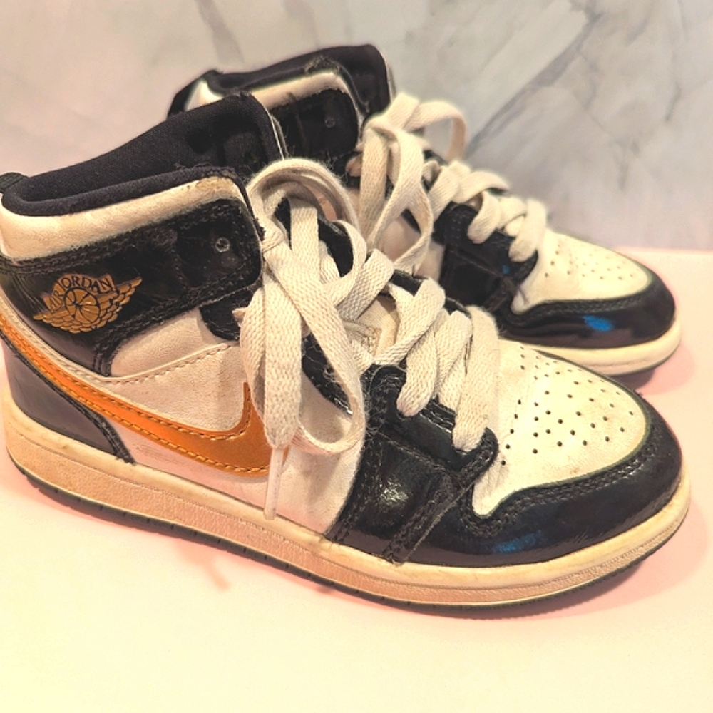 Air Jordan Nike Kids' Black and Gold Sneakers